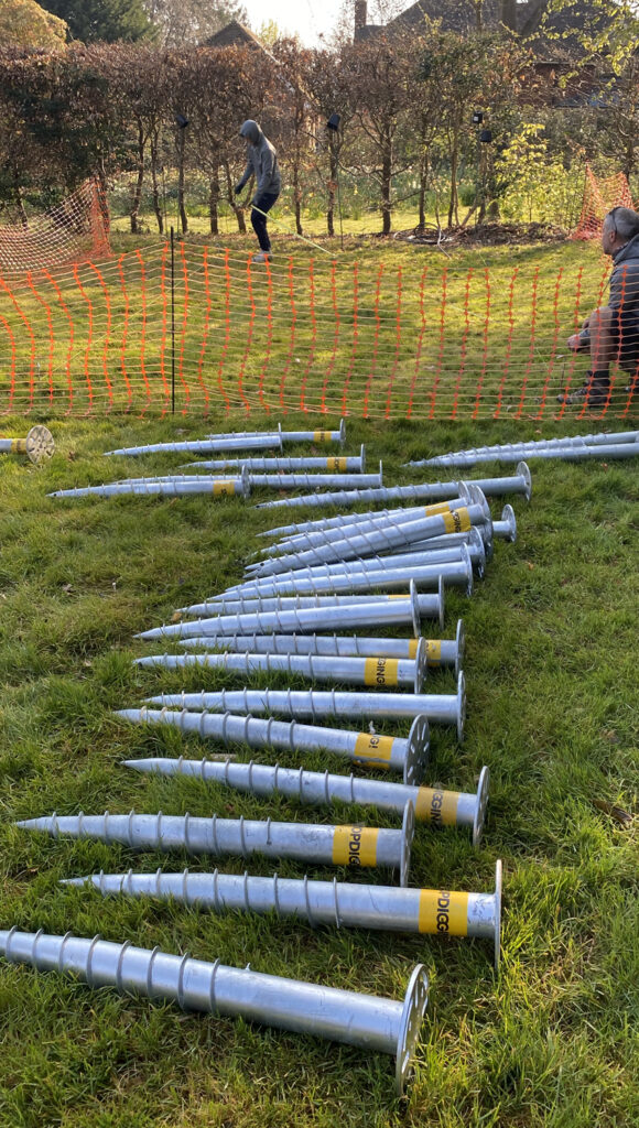 photo of ground screws laid on the floor
